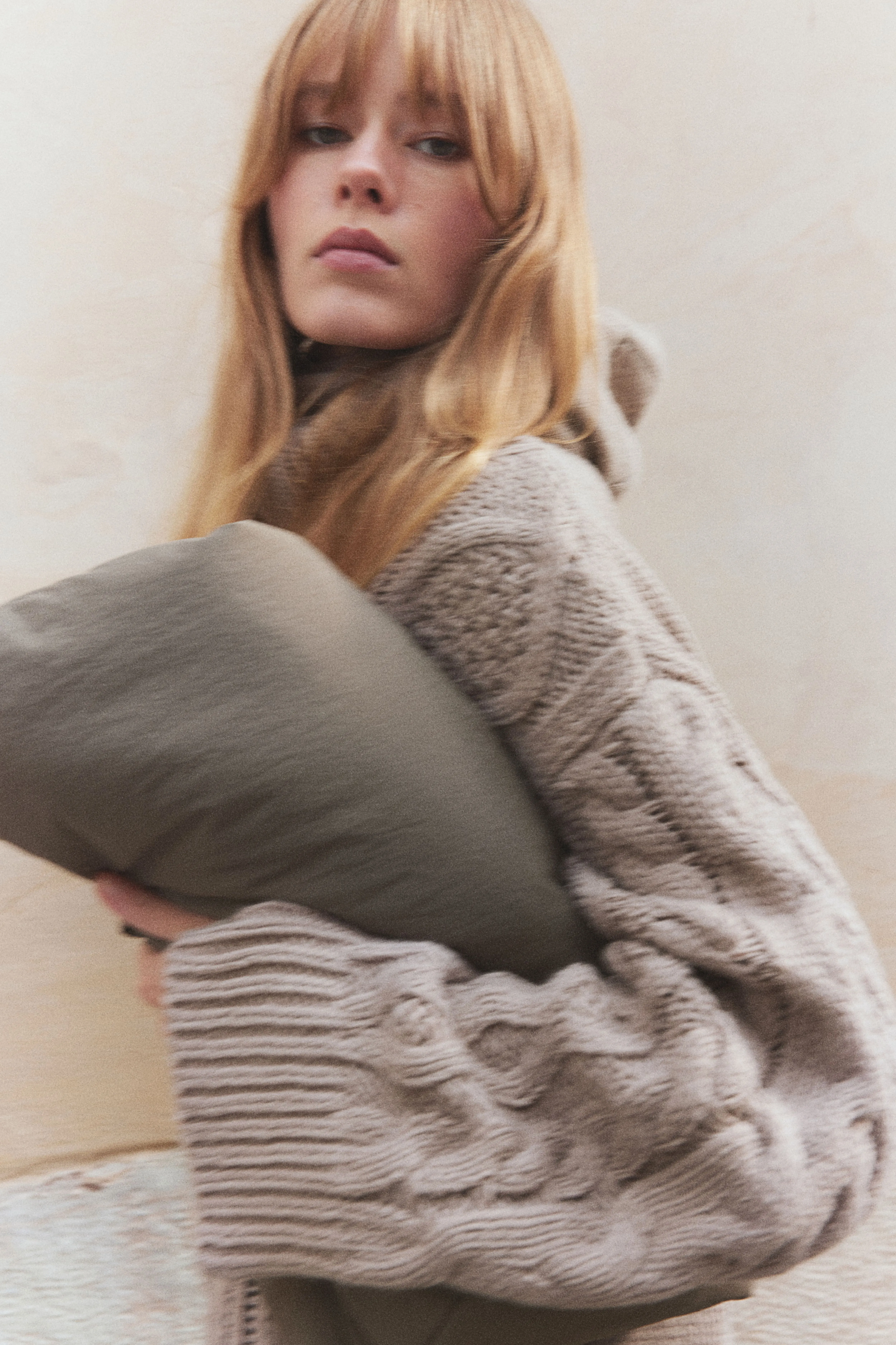 Dolcevita in maglia a trecce