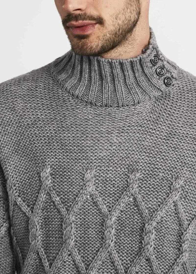 Maglia dolcevita a trecce