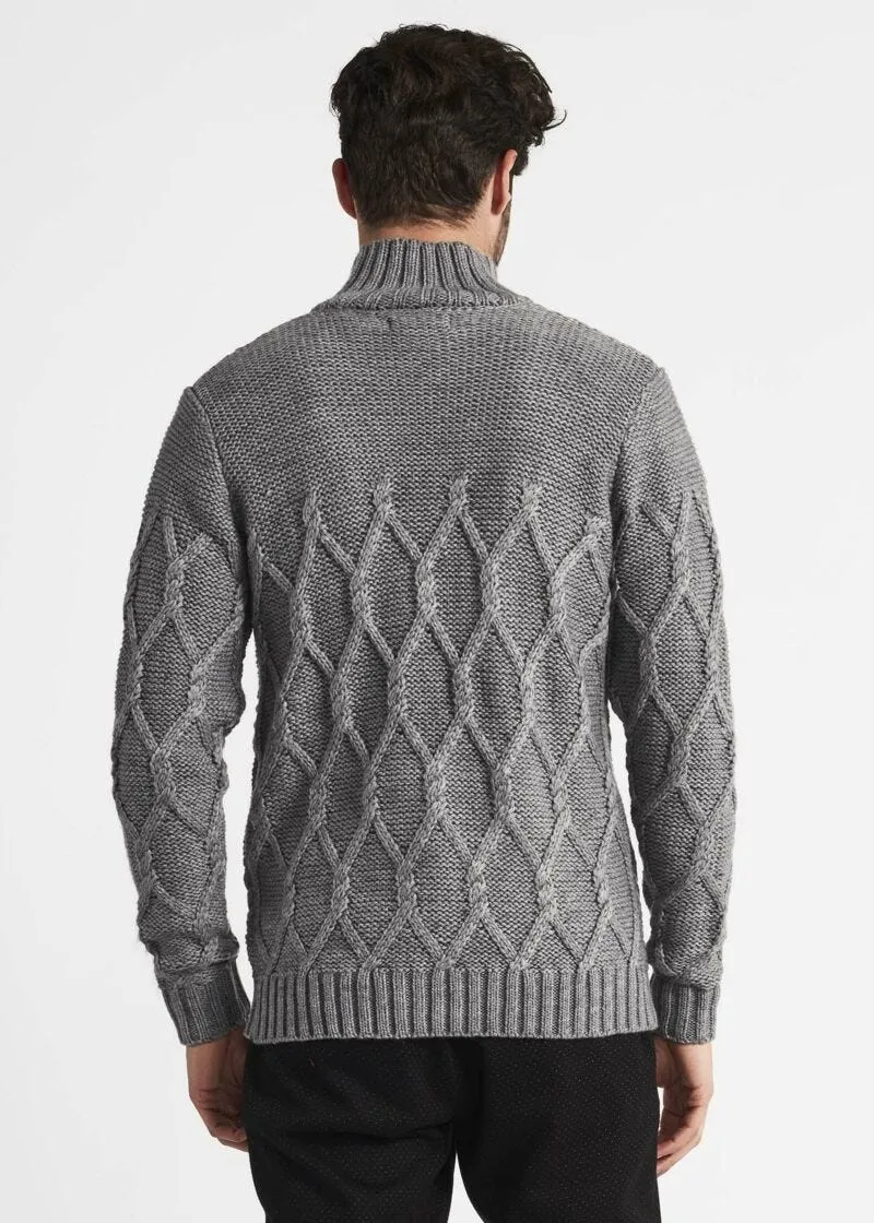 Maglia dolcevita a trecce