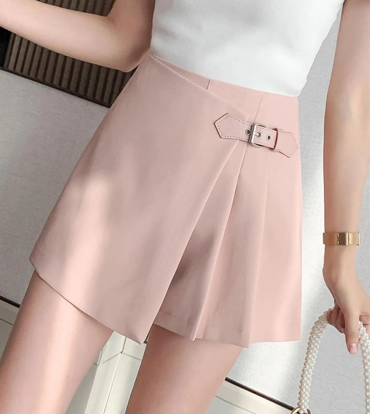 Minigonne da donna irregolari rosa Pantaloncini con bottoni 2023 Vita alta Abbigliamento da lavoro casual Gonne corte a gamba la