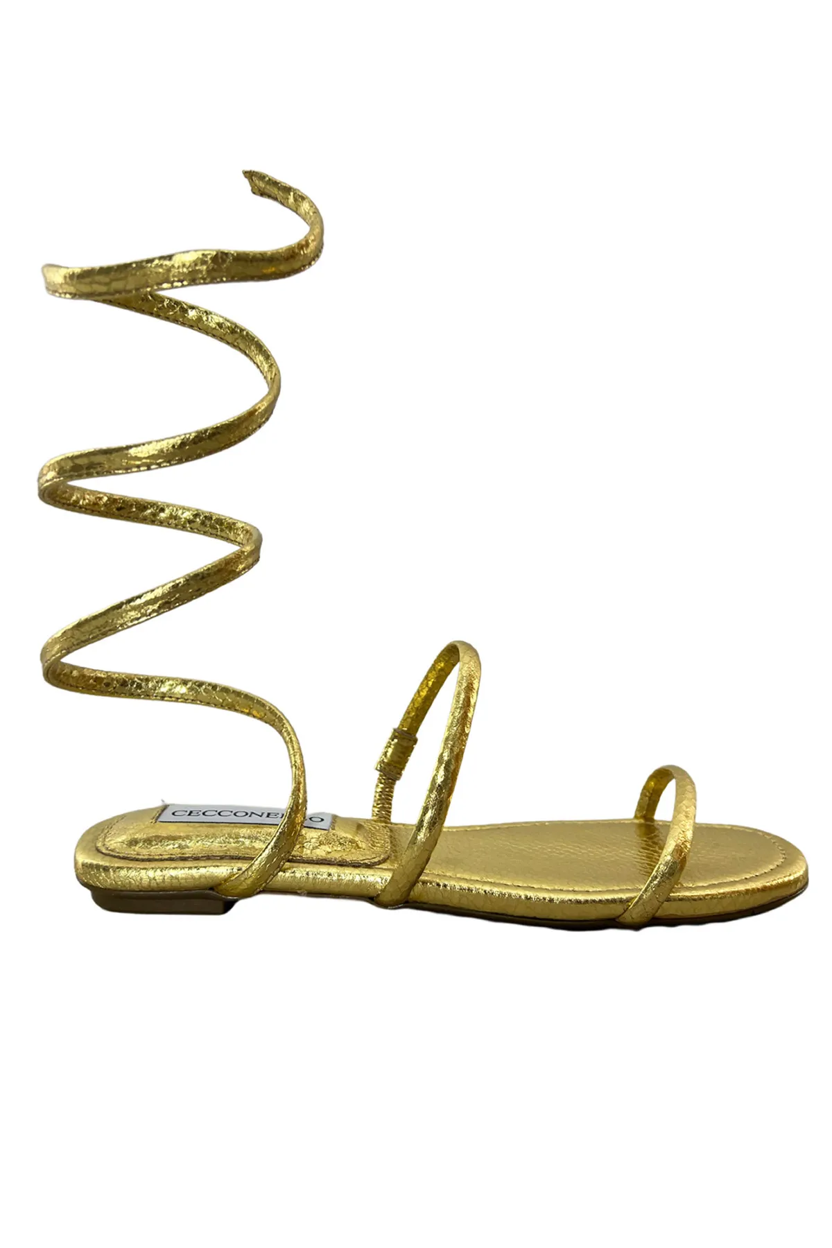 Sandalo donna basso con bracciale rigido alla gamba pelle effetto pitonato oro