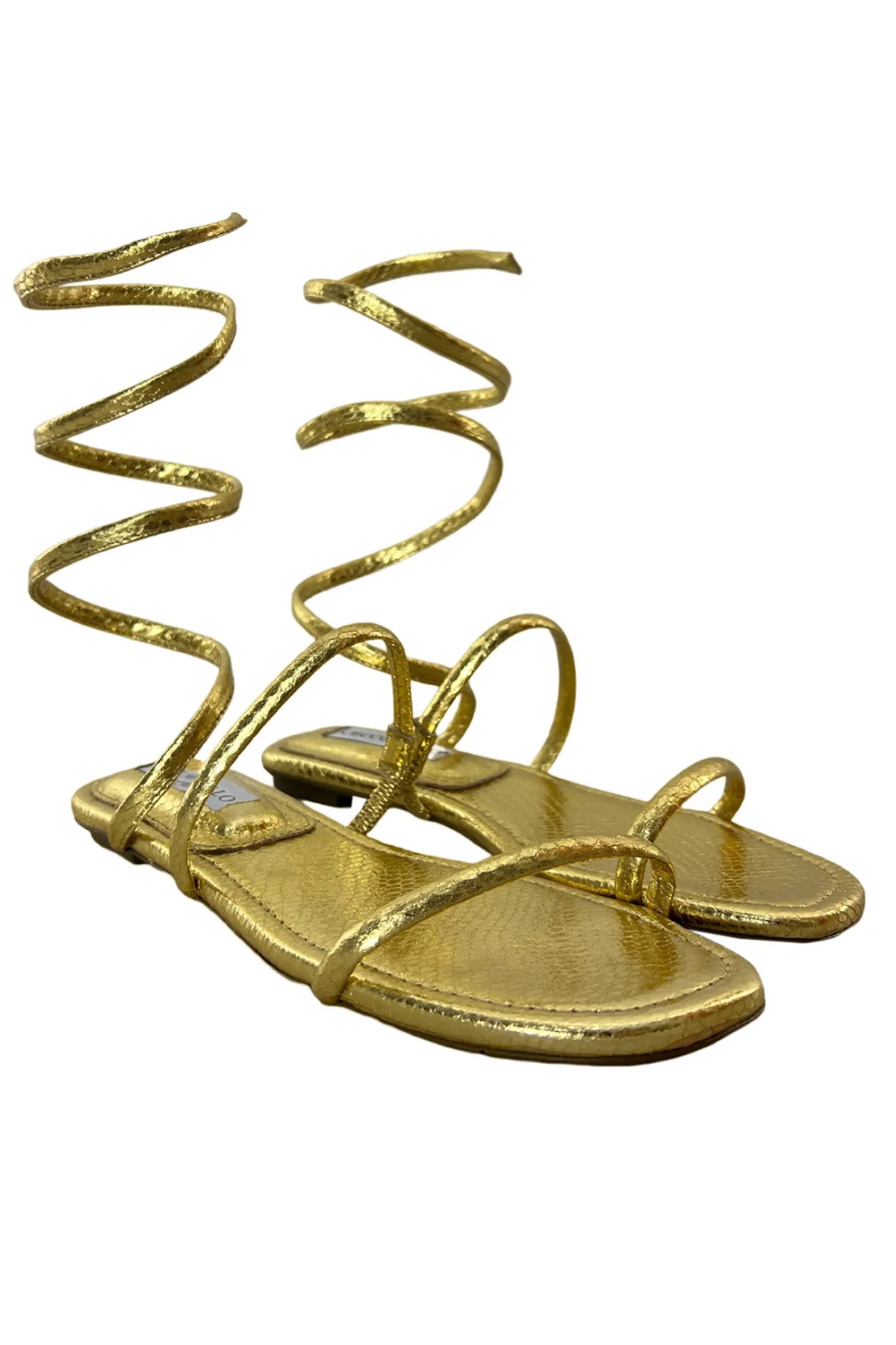 Sandalo donna basso con bracciale rigido alla gamba pelle effetto pitonato oro
