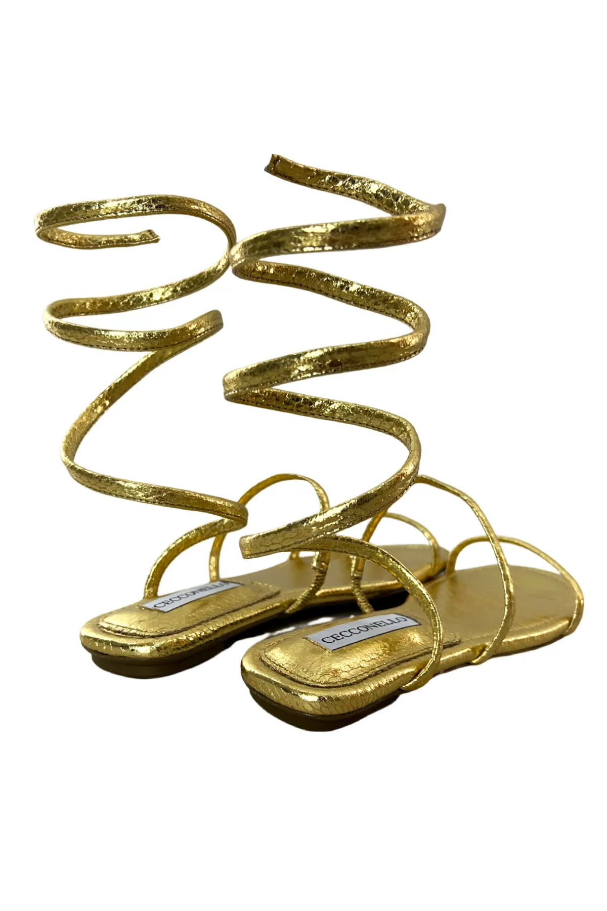 Sandalo donna basso con bracciale rigido alla gamba pelle effetto pitonato oro