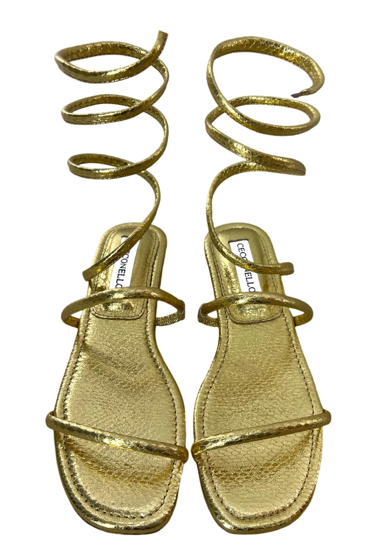 Sandalo donna basso con bracciale rigido alla gamba pelle effetto pitonato oro