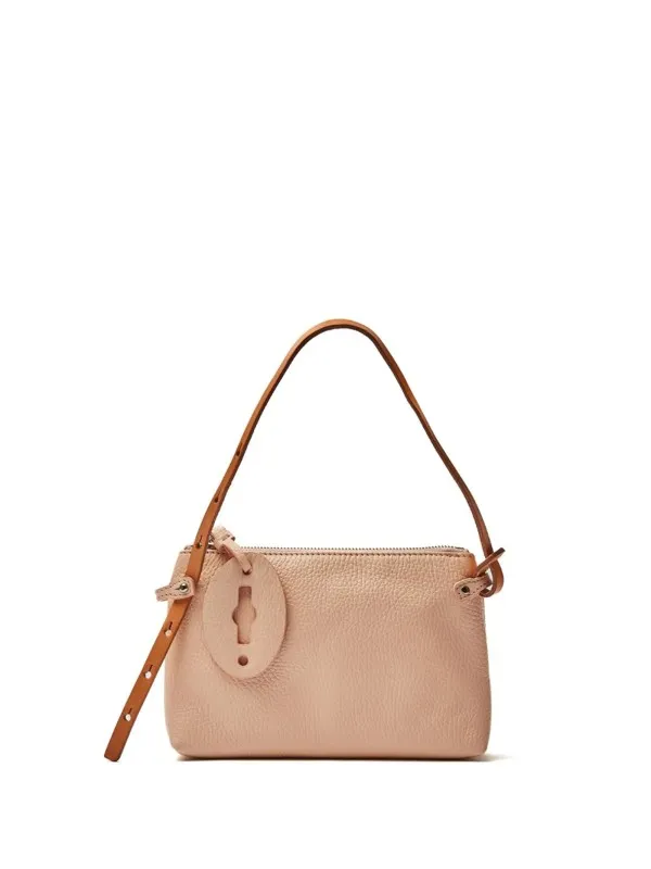 Tuka Daily pink leather clutch bag